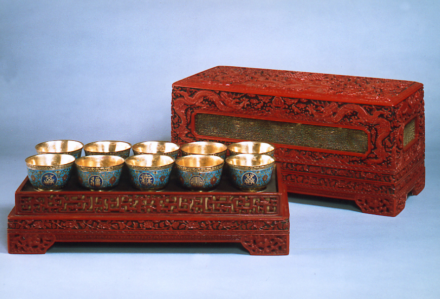 Carved red lacquer banquet utensil box