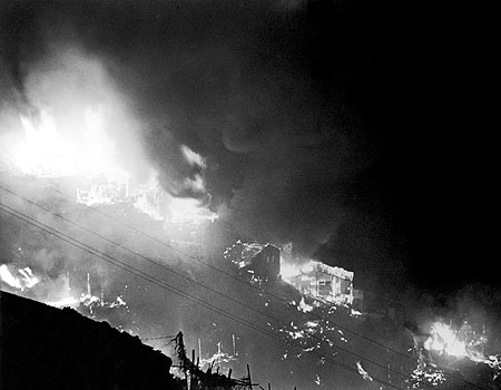 The Shek Kip Mei squatter area in conflagration on Christmas evening, 1953.