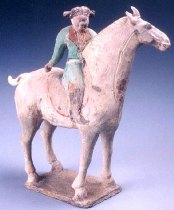 Painted pottery burial figurine of woman polo player