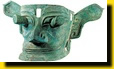 Bronze mask with protruding pupils