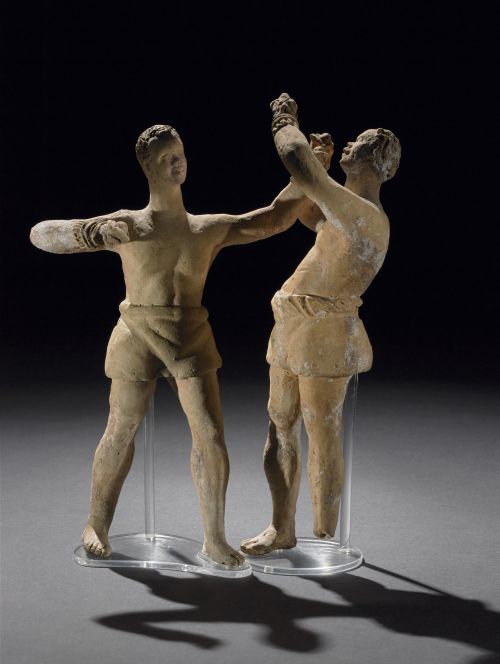 Terracotta statuettes of African boxers