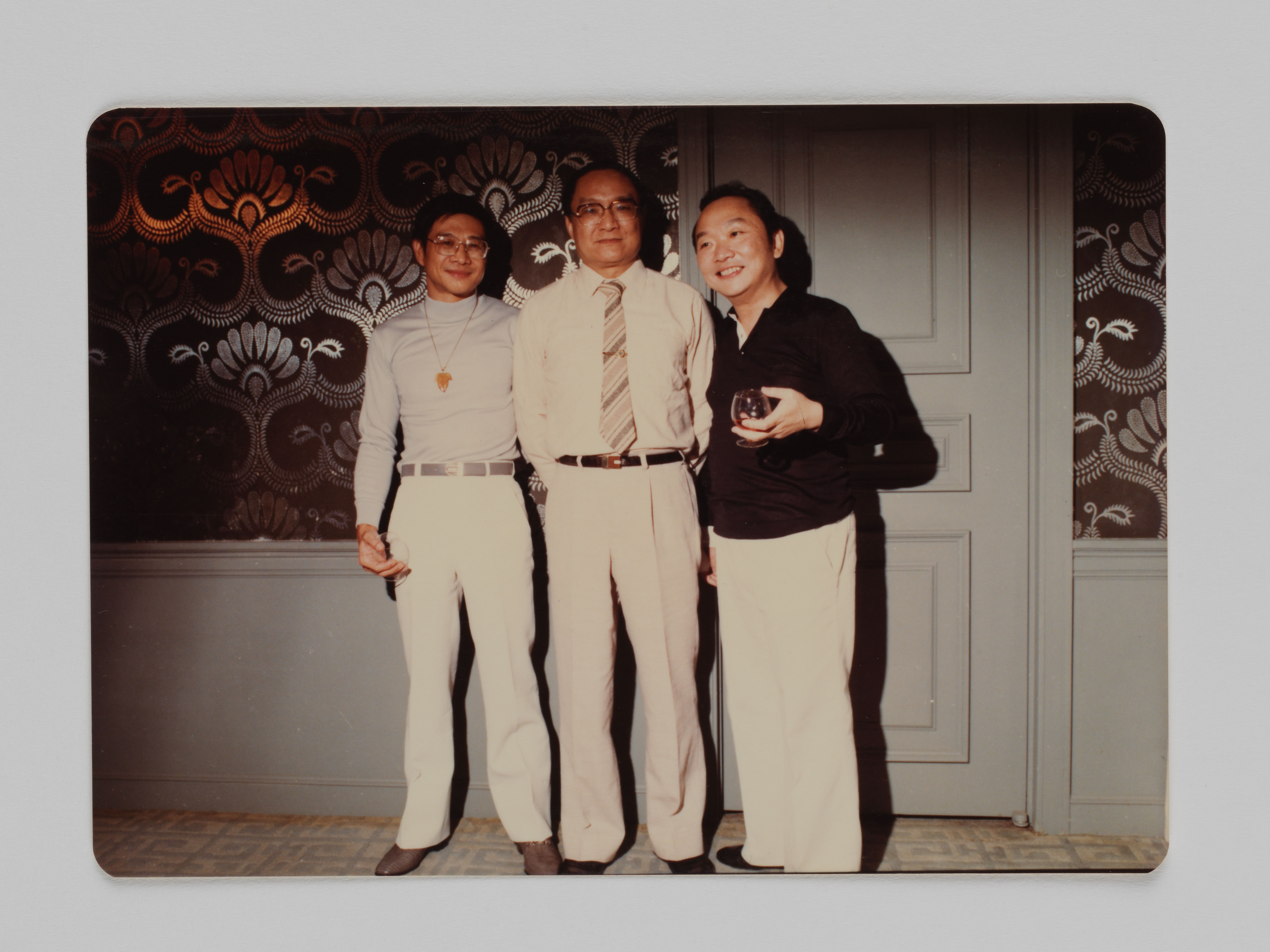 Louis Cha with renowned novelists Ni Kuang (left) and Gu Long (right)