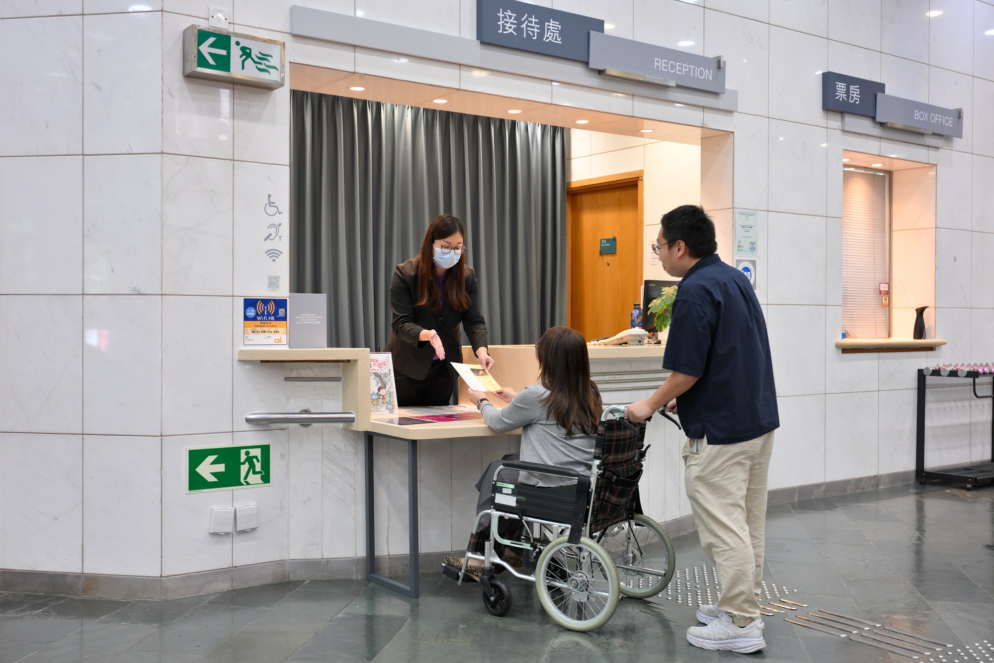 Enquiries counter for wheelchair users and assistive listening system at the box office and enquiries counter