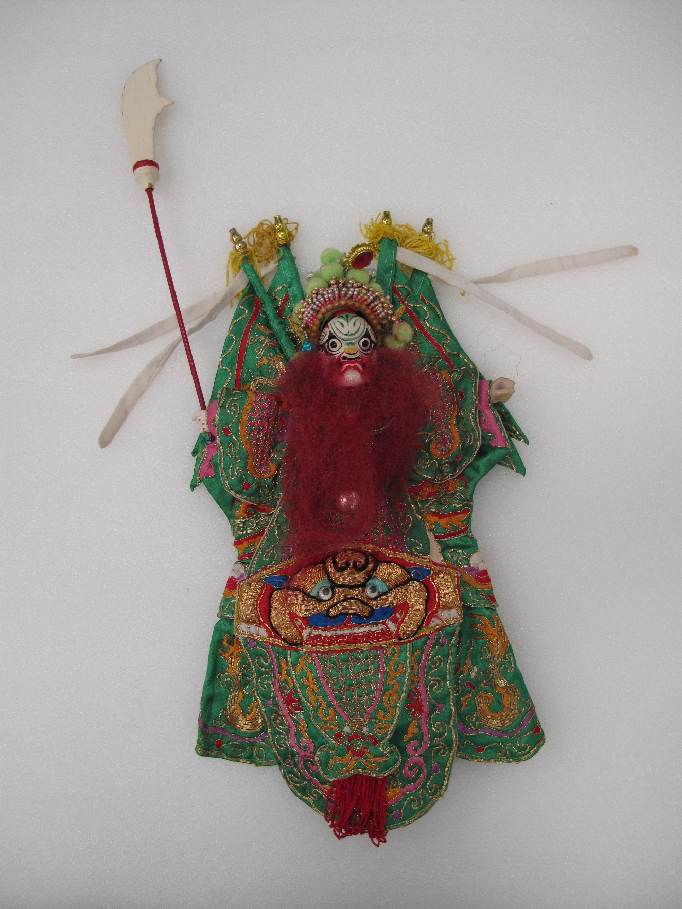 Hand puppet with green painted face made in Fujian