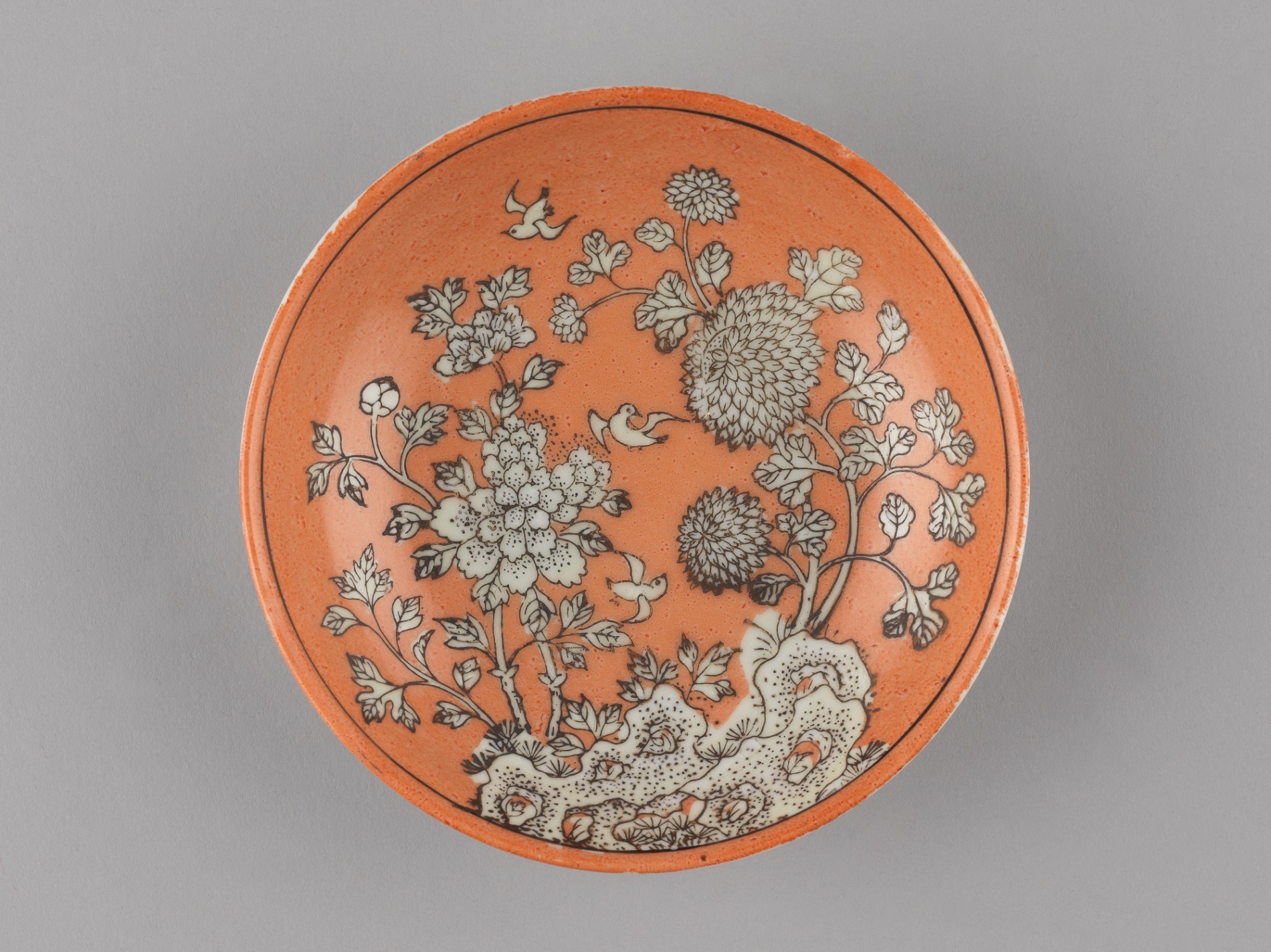 Plate with fauna and flowers on red-ground
