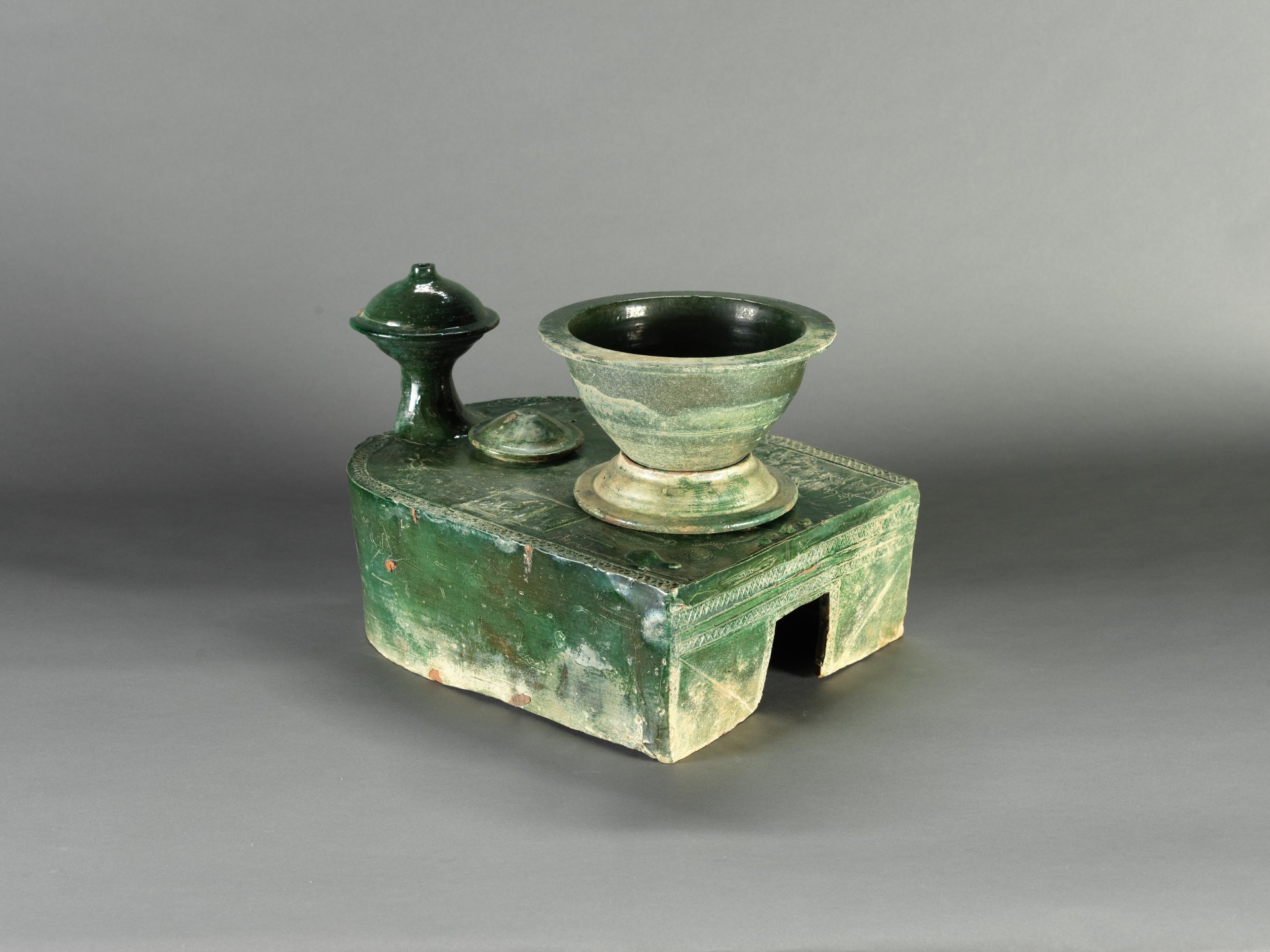 Stove in green glaze