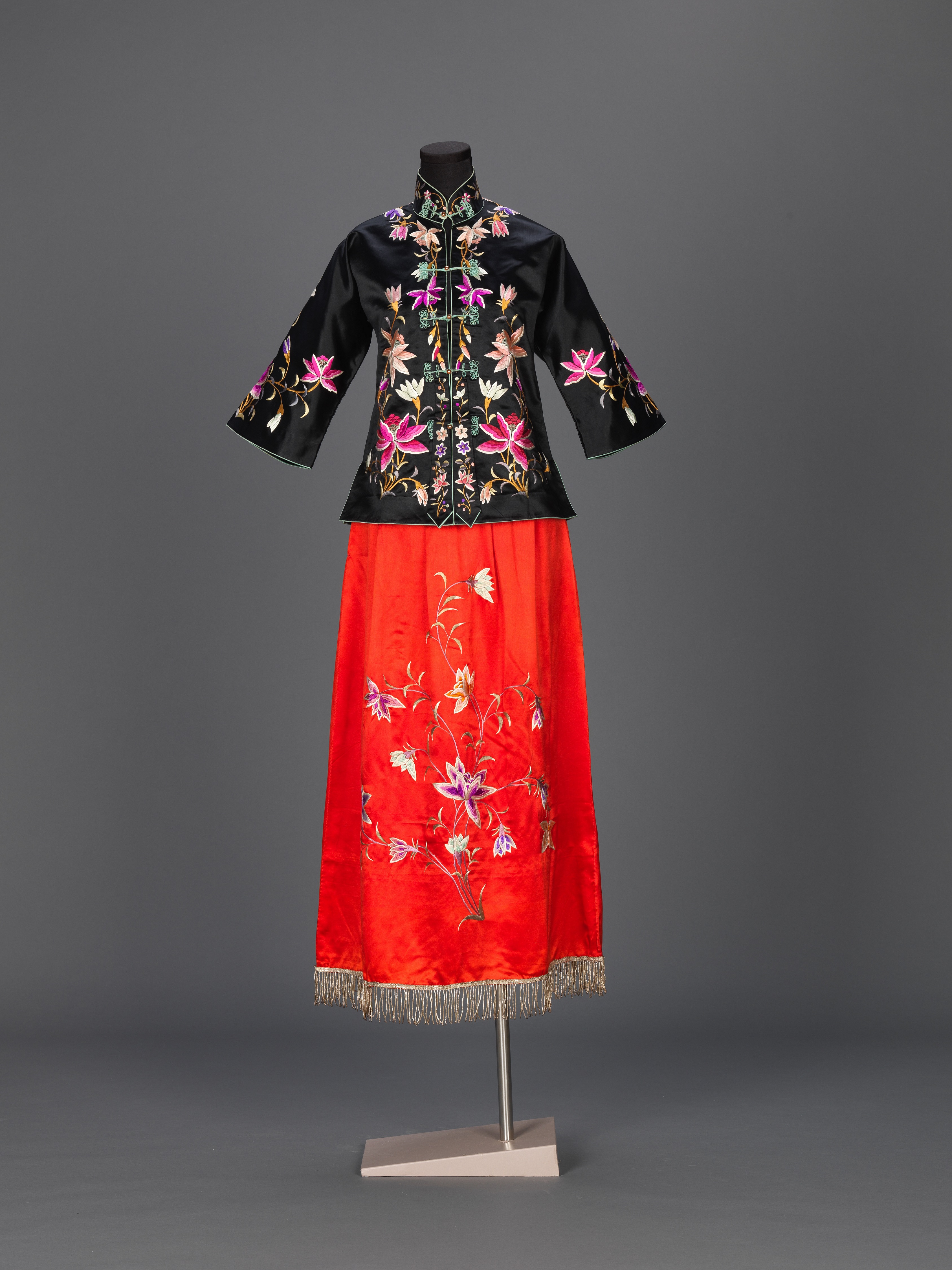Bridal suit embroidered with peony motifs in multi-coloured threads