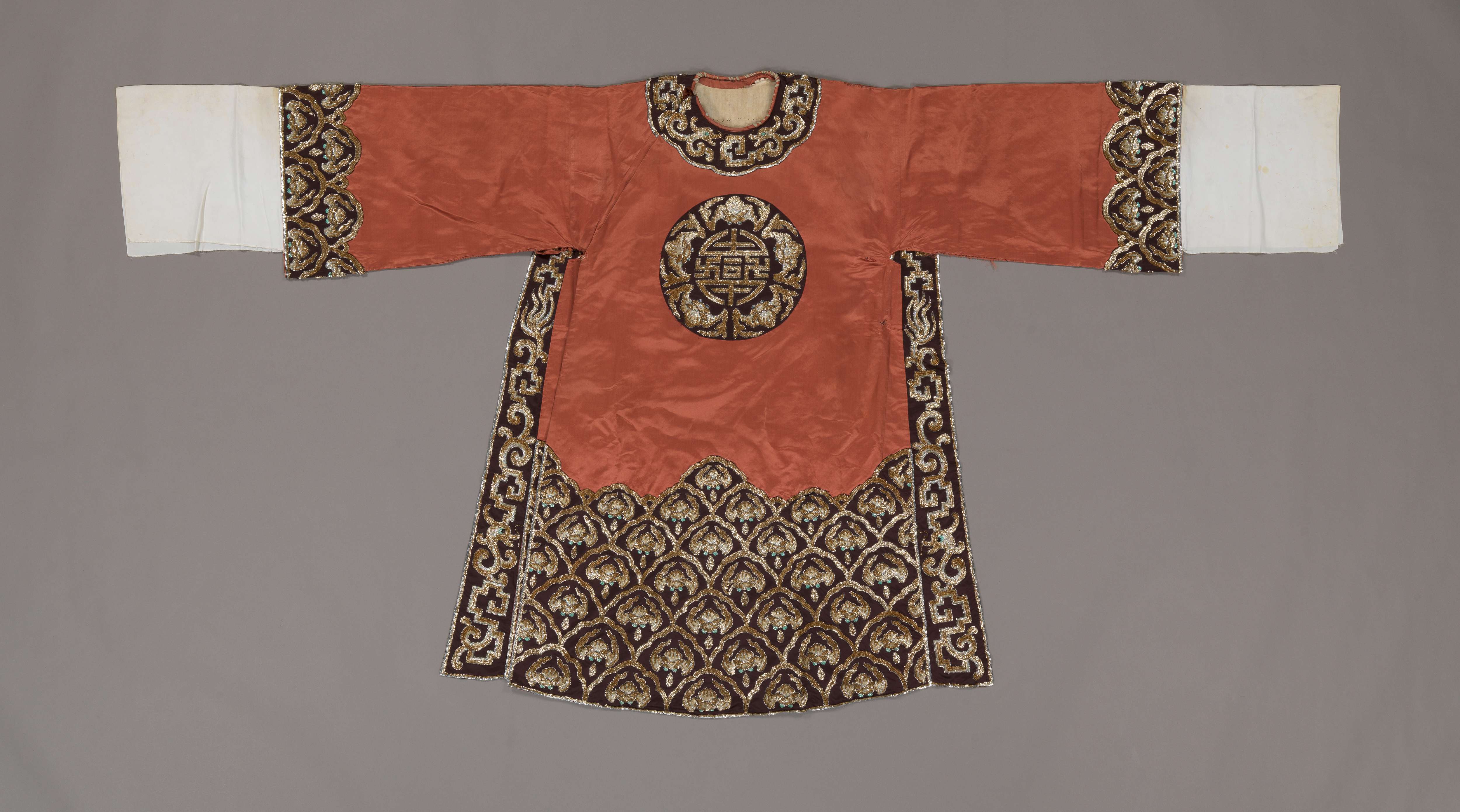 Brown man's python ceremonial robe with gold and silver sequins