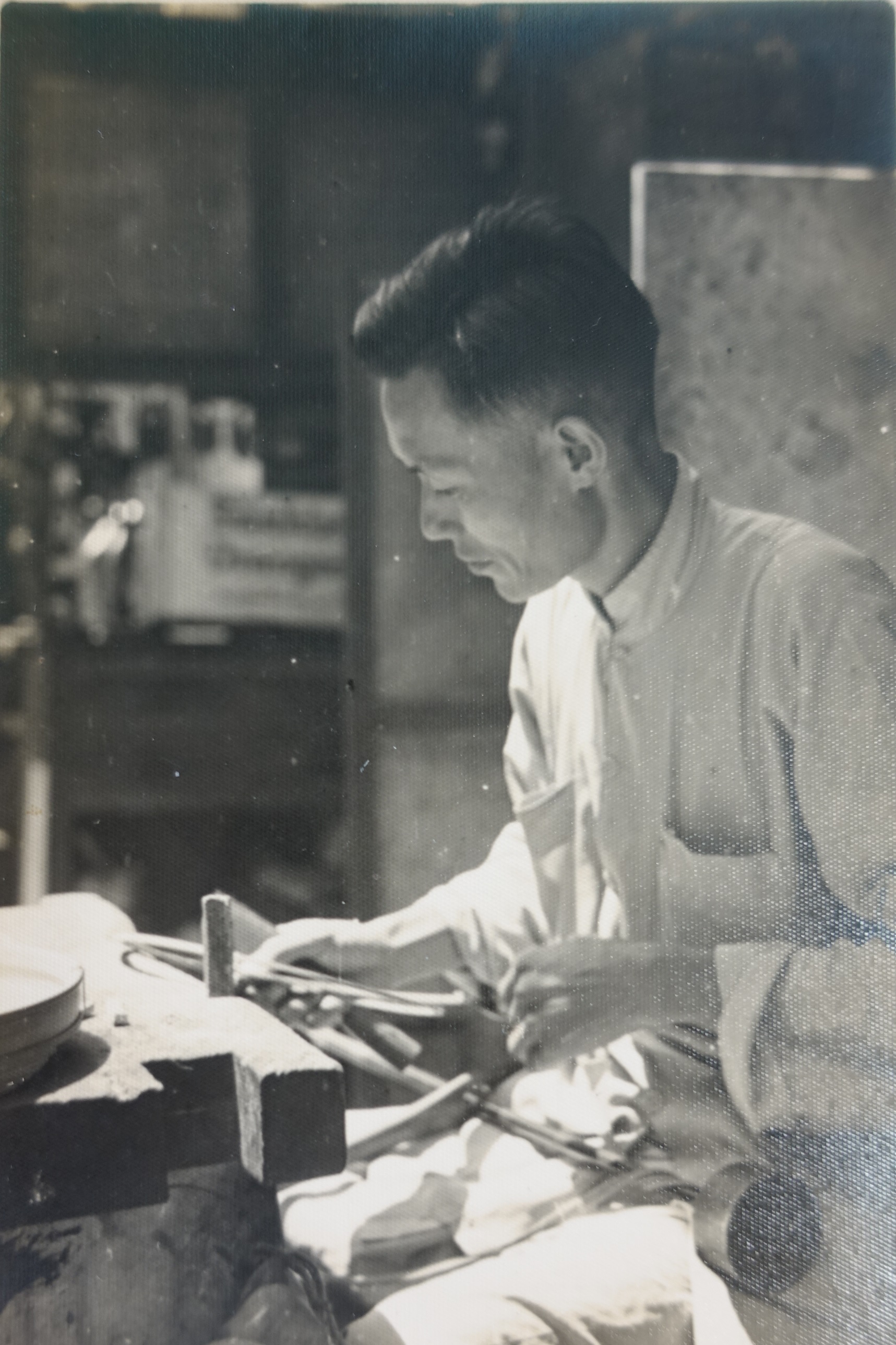 Master Cheuk Hong, a local renowned birdcage craftsman