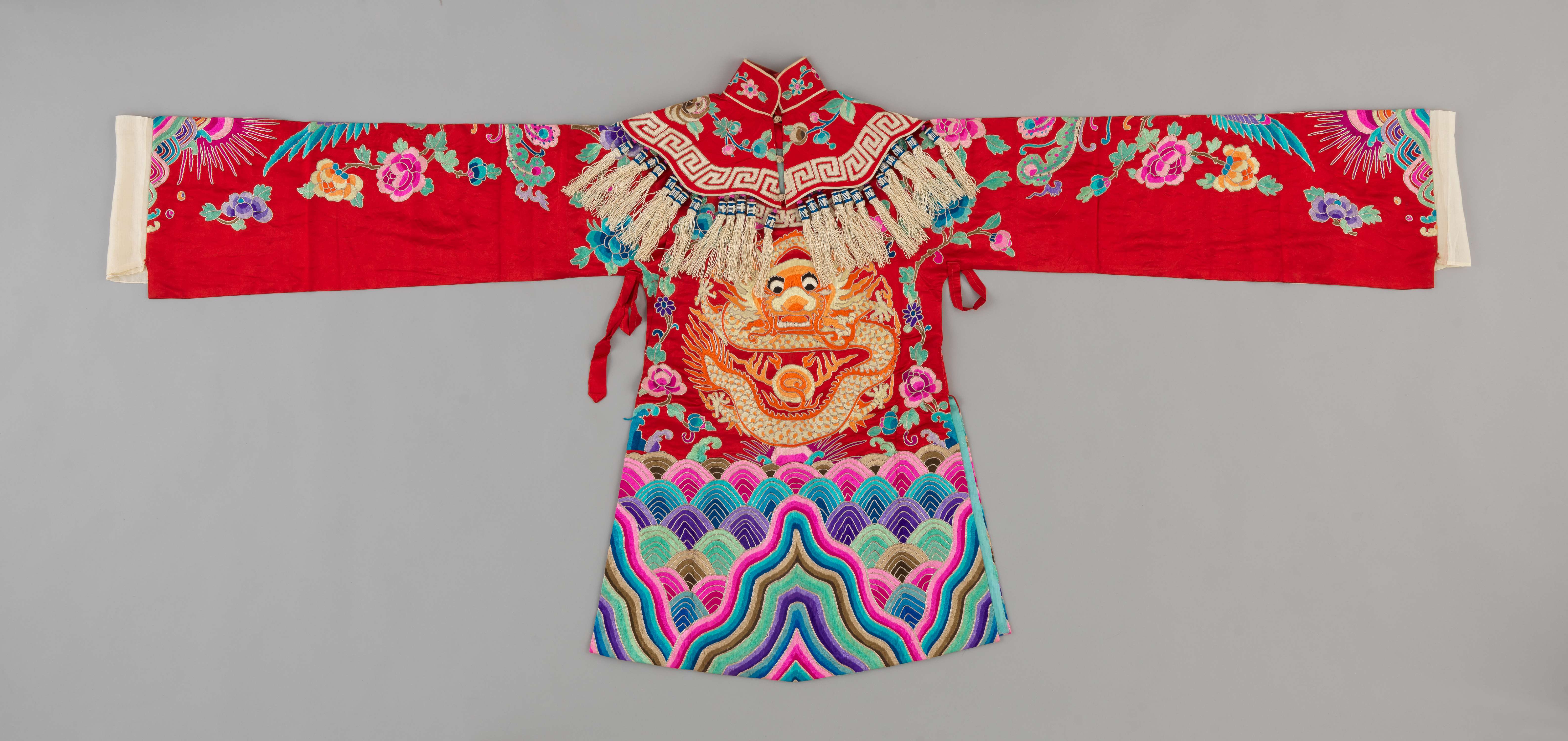 Red woman's python ceremonial robe embroidered with dragon motifs